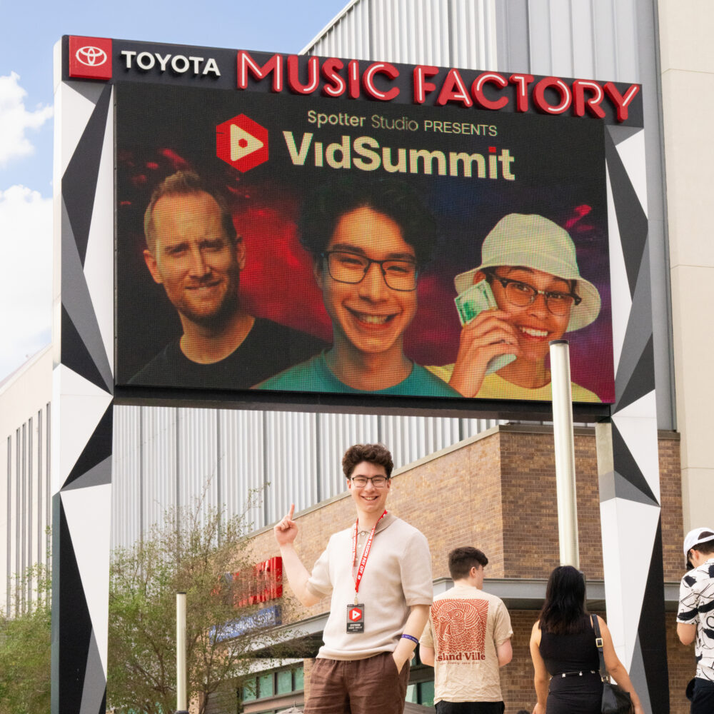 Jordan pointing at VidSummit Billboard (2)